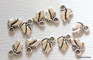 Silver tone new born baby feet charms x 11